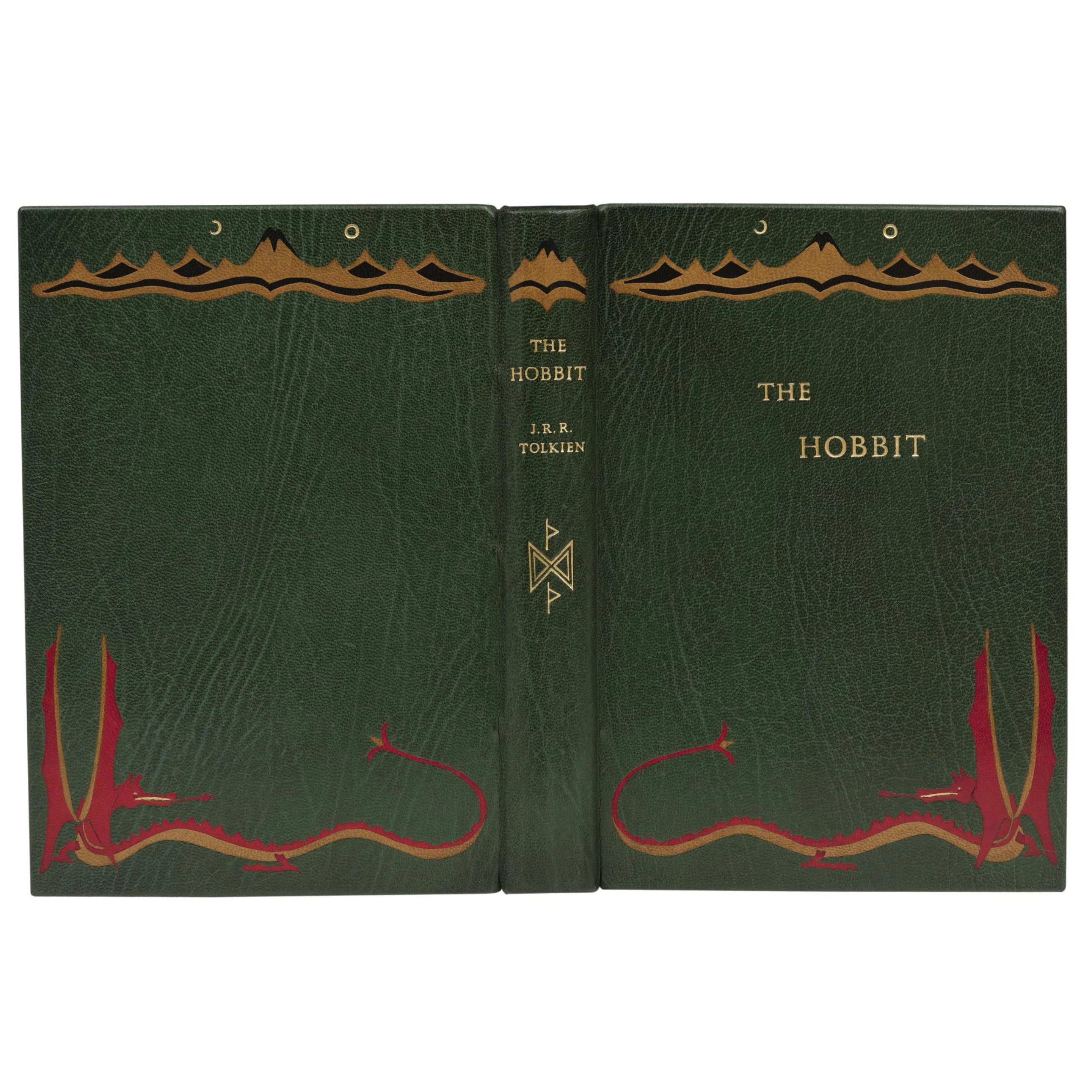 Bayntun-Riviere rebound first impression of The Hobbit in green morocco with Smaug and mountain onlays.